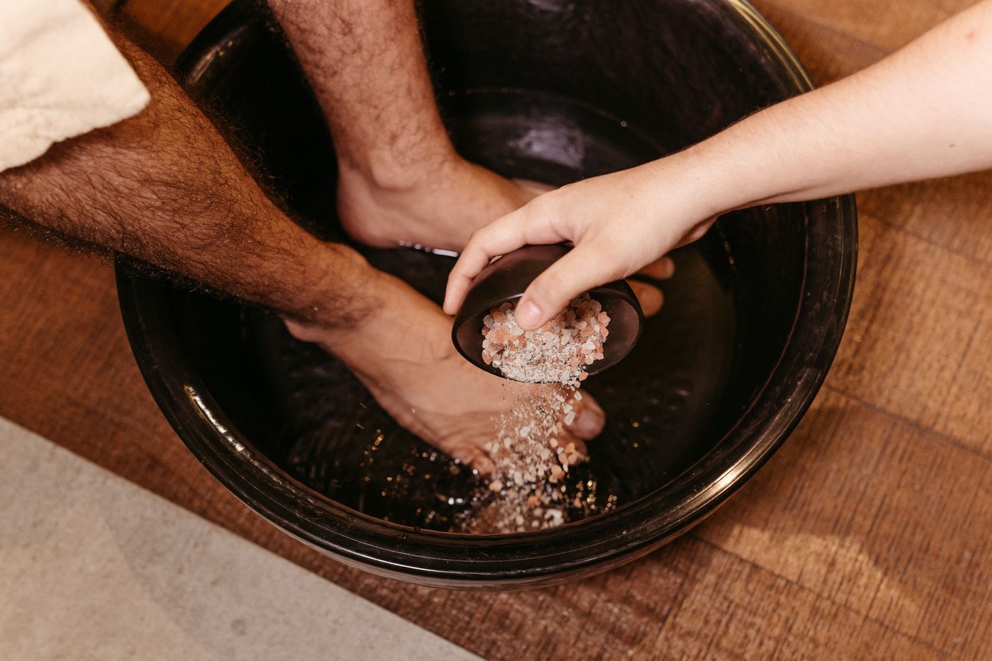 Mineral salt foot soak in a warm basin